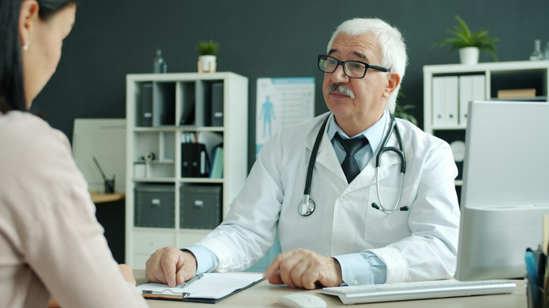 health insurance expert advising client