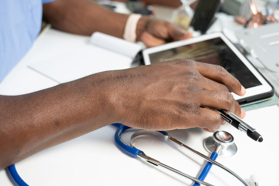 doctor discussing insurance with patient
